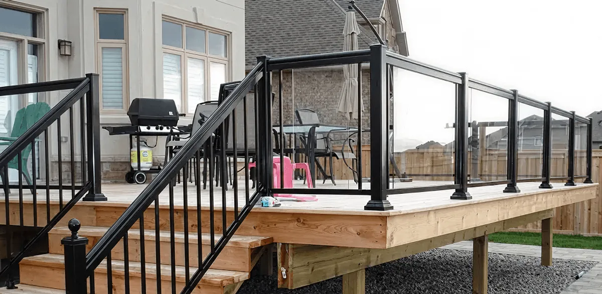 Handrail installation on a deck staircase for safety and code compliance in Sarasota, FL